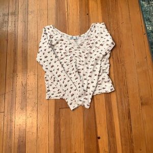 white floral long sleeved shirt